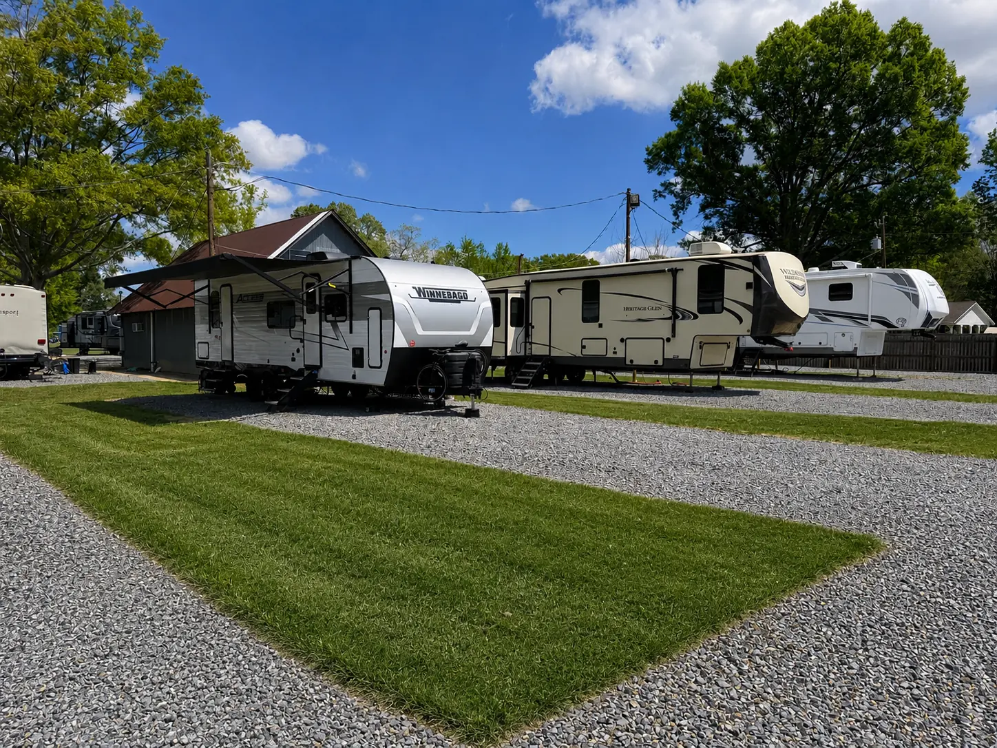 Shaded RV site with full hookups at Feliciana Oaks RV Park